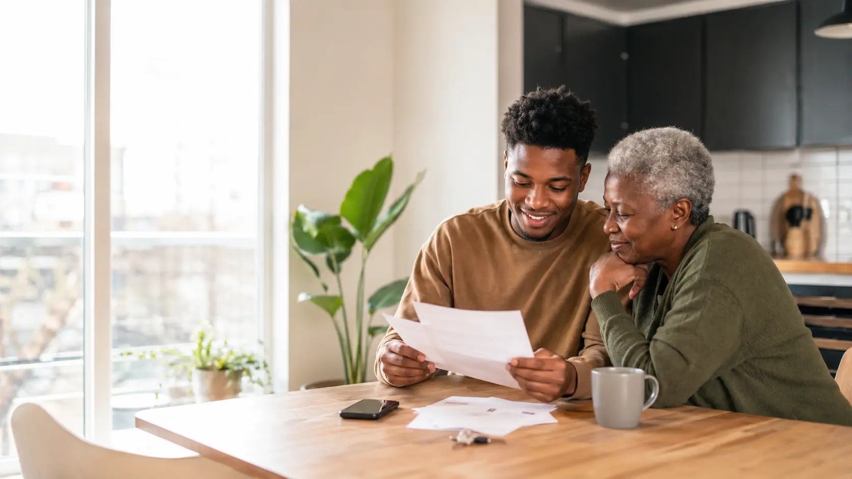 Buyer calculating the costs of a new-build home with a notebook